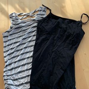 Pair of maternity tank tops, black and gray and white striped. Size small.